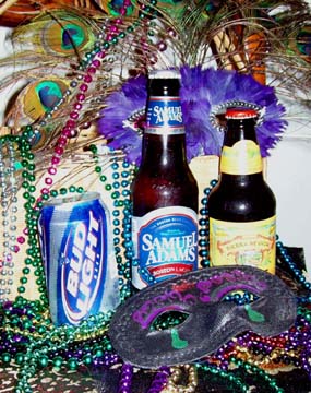 image of three beers against colorful mardi gras beads and mask